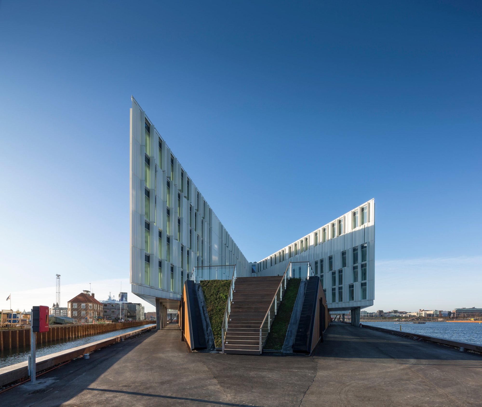 UN City in Copenhagen, the conference venue, on the harbour under a clear blue sky
