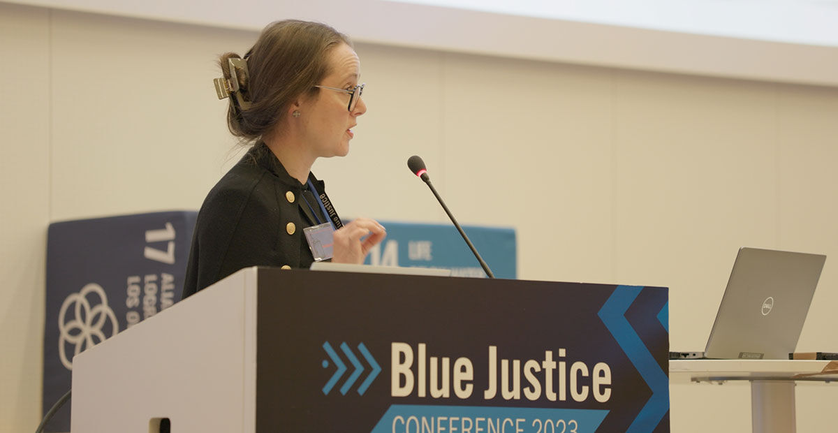 A speaker at the Blue Justice Conference 2023 podium