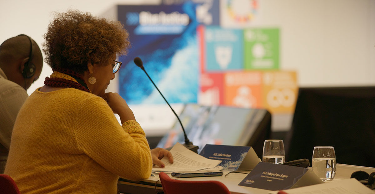 A delegate listening during a session