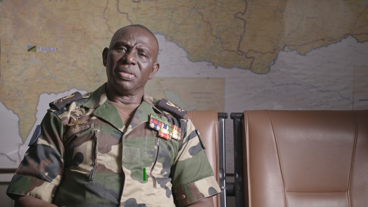 Lieutenant General Balla Keita, MINUSCA Force Commander, interviewed in front of a map