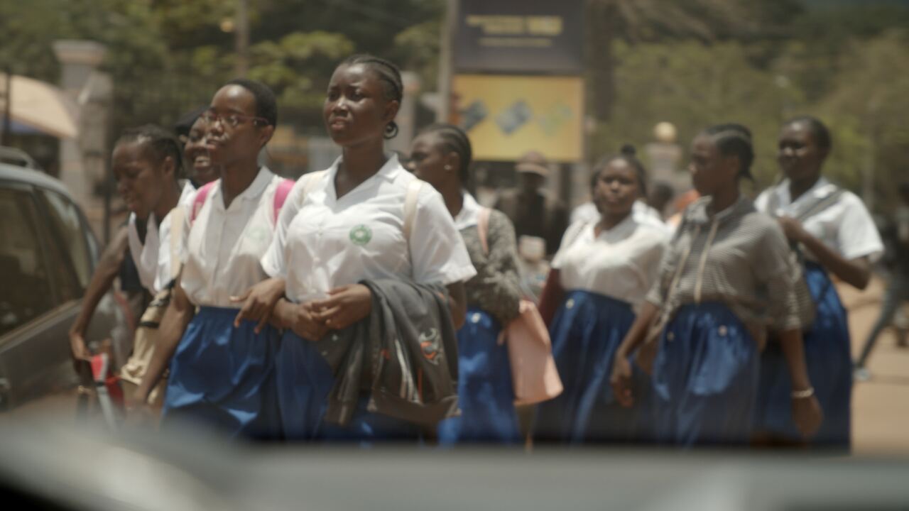 Schoolgirls in uniform walking through the city