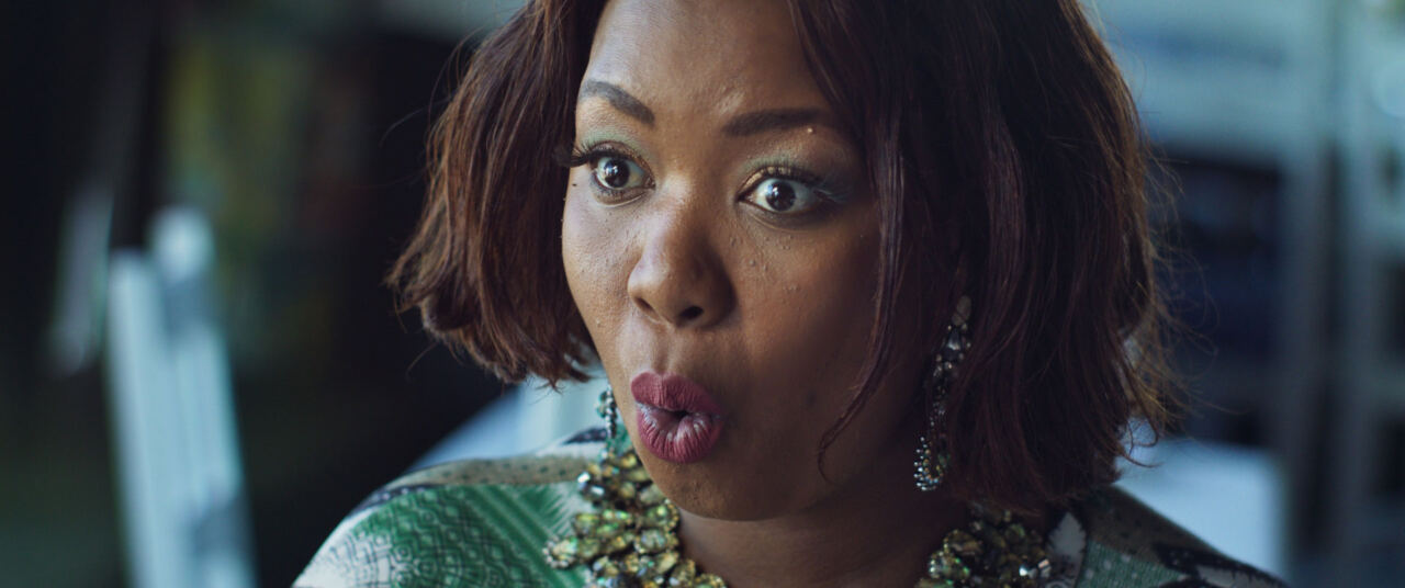 A woman's shocked face as her plate arrives